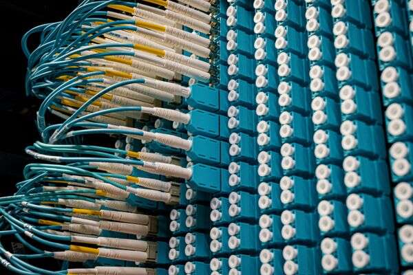 Clean fibre and structured cabling installed in a commercial telecommunications room