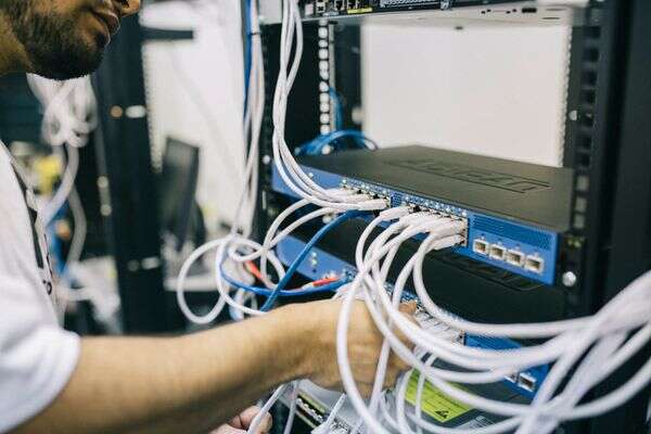 Organized structured cabling terminated in a commercial network rack