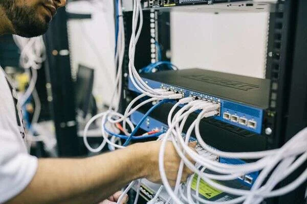 Organized structured cabling terminated in a commercial network rack